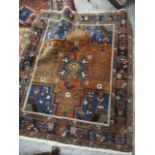A Turkistan orange ground floral rug decorated with trees and triple guard border, A/F, 60" x 49"