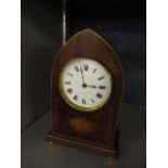 An Edwardian mahogany mantle clock having an eight day movement