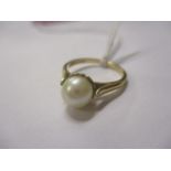 A 9ct gold pearl set ring