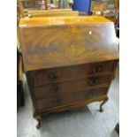 A reproduction mahogany furniture to include a three drawer bureau, 39 1/2"h x 31" and a six