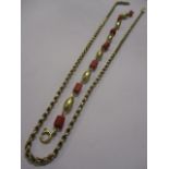 A yellow metal and coral bracelet, the clasp stamped 750, together with a yellow metal necklace