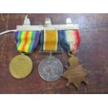 Three WW1 medals to include a Star, Victory and War medal