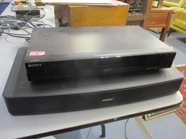 A Sony DVD recorder, together with a Bose surround-sound speaker