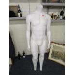 A vintage male mannequin