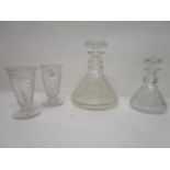 A step cut glass decanter and stopper, 7" h, two matching tumblers, 4 2/8" h and a matching