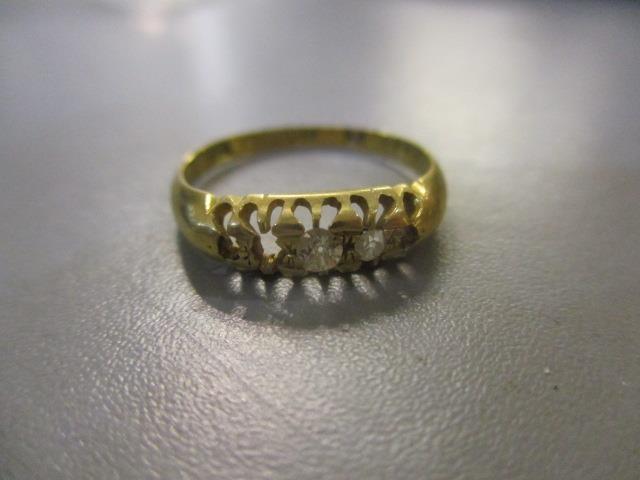 An 18ct gold diamond ring A/F