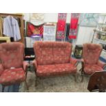 An Ercol cottage suite with loose upholstered cushions