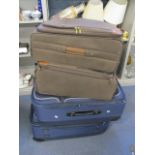 A quantity of miscellaneous suitcases