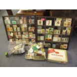 A selection of matchboxes, some in a display case