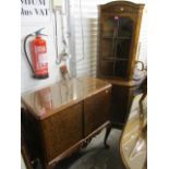 A reproduction Queen Anne style two door cabinet, 40" h x 35 1/4" w and a matching corner cabinet,