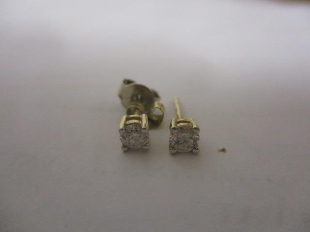 A pair of diamond earrings