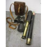 Two telescopes and a leather cased pair of binoculars