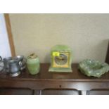 An Elsinore onyx cased mantel clock, an onyx table lighter and ashtray and three pewter mugs