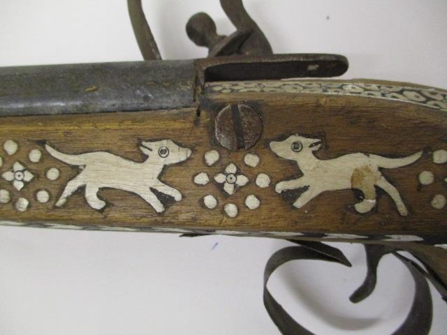 A 20th century bone inlaid Turkish Flintlock action pistol decorated with animals and floral motifs, - Image 2 of 6