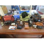 A quantity of vintage and later folding and cased cameras to include a Paxette Prontor - 5 camera,