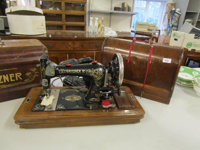 Two hand operated sewing machines, in walnut finished cases - Image 3 of 3