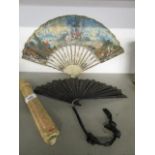 A French 19th century pictorial fan with bone guards and struts depicting figures in an extensive