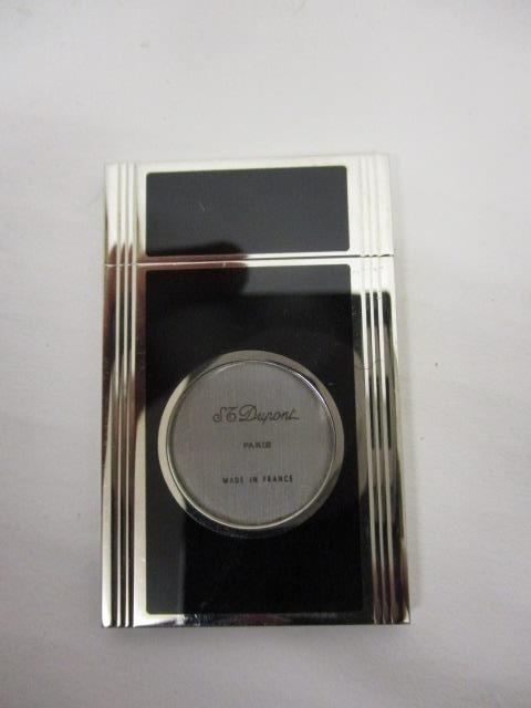 A DuPont white metal and lacquered cigar cutter no 87994 with certificate and booklet in a - Image 7 of 14