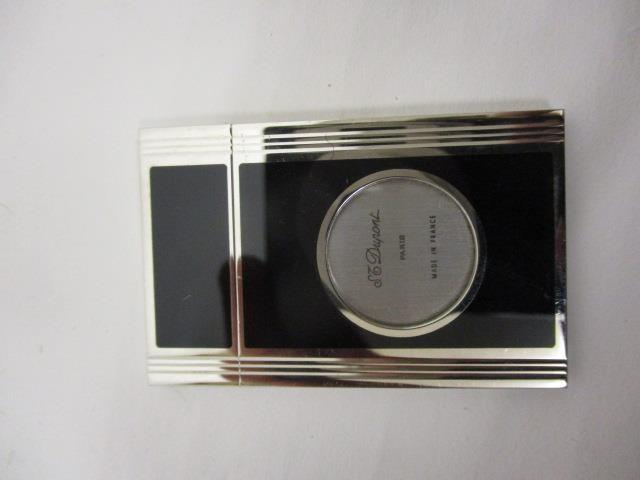 A DuPont white metal and lacquered cigar cutter no 87994 with certificate and booklet in a - Image 9 of 14