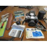 A Minolta XG-M camera and accessories