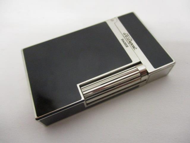 A DuPont white metal and lacquered cigar cutter no 87994 with certificate and booklet in a - Image 11 of 14