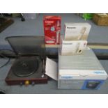 Electricals to include a record play, a Panasonic phone and remote phone boxed, 15l Cross cut