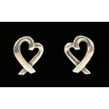 A pair of TIFFANY & CO silver heart shaped Earrings by Paloma Picasso