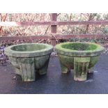 A pair of carved sandstone Planters on three square cut supports 2ft D