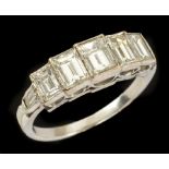 A Diamond five stone Ring millegrain-set graduated step-cut stones, estimated total diamond wieght