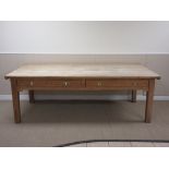 A large 19th Century pine Kitchen Table fitted two drawers on square legs, 4ft x 8ft