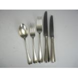 Twelve Edward VII silver Dinner and Dessert Forks and eleven Dessert Spoons Hanoverian pattern
