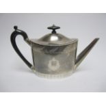 A George III silver oval Teapot with engraved frieze and crests, ebonised handle, London 1797,