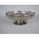 A George V silver circular Fruit Bowl with pierced rim, Birmingham 1931