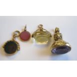 A 9ct gold Swivel Fob set carnelian and bloodstone, a small Fob set carnelian, a Citrine Swivel