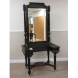 A 19th Century ebonised Dressing Table with recessed triptych mirror and recessed front fitted three