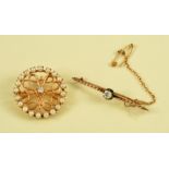 A Diamond and Cultured Pearl circular Brooch claw-set single brilliant-cut diamond in openwork