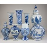 Eight Continental blue and white Delft Vases, including a rare vase and cover painted with