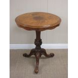 A 19th Century burr walnut Pillar Table the quartered moulded top above a shaped frieze on a