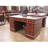 A 19th Century mahogany pedestal Desk with leather inset top, fitted nine drawers with plinth base