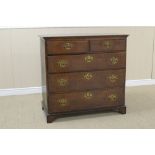 An 18th Century oak Chest of two short and three long drawers on bracket feet, 3ft 3in