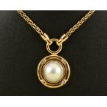 A Mabé Pearl and Diamond Pendant set half pearl in simple frame rub over-set four brilliant-cut