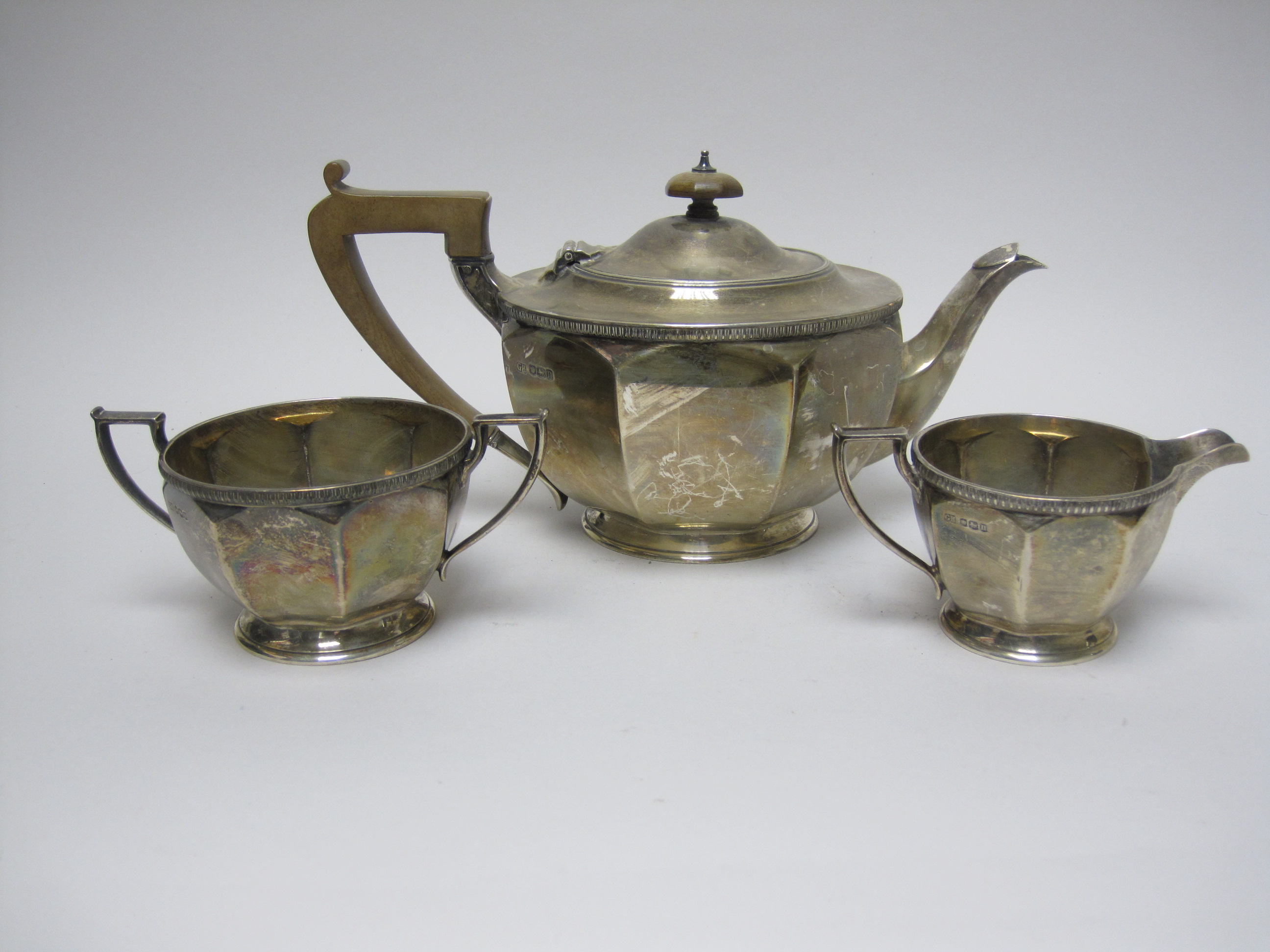 A George V silver circular three piece Tea Service, Sheffield 1930 - Image 2 of 4