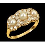 A Pearl and Diamond triple Cluster Ring set three graduated pearls within frame of old-cut diamonds,