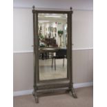 A 19th Century French green and blue painted Cheval Dressing Mirror, the tapering columns with brass