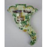 A Whieldon pottery cornucopia Wall Pocket, c1780, moulded decoration depicting a house and windmill,