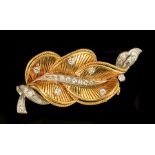 A Diamond Leaf Brooch the openwork plaque claw and pavé-set brilliant-cut diamonds in 18ct white and