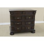 A late 17th Century oak Chest of four long drawers with applied mouldings on bun feet, 3ft 2in