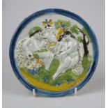 A Prattware polychrome pearlware circular Plaque, c1820, relief moulded with classical figures,