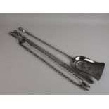 A set of 19th Century polished steel Fire Tools with twist stems and knopped finials