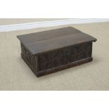 A 17th Century oak Bible Box with leafage scroll carved front, 2ft 3in